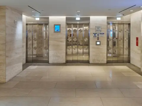 Interior elevator bank, world diamond tower lobby renovation, 580 Fifth Avenue at 47th Street, Manhattan