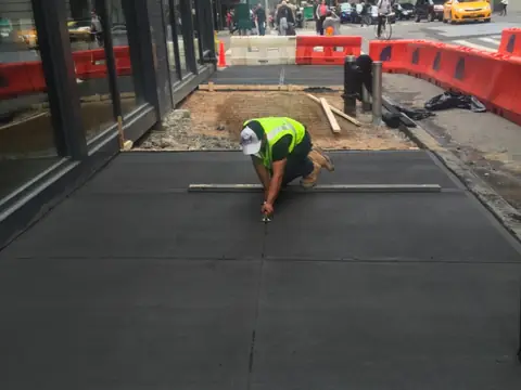 Sidewalk and curb work in New York